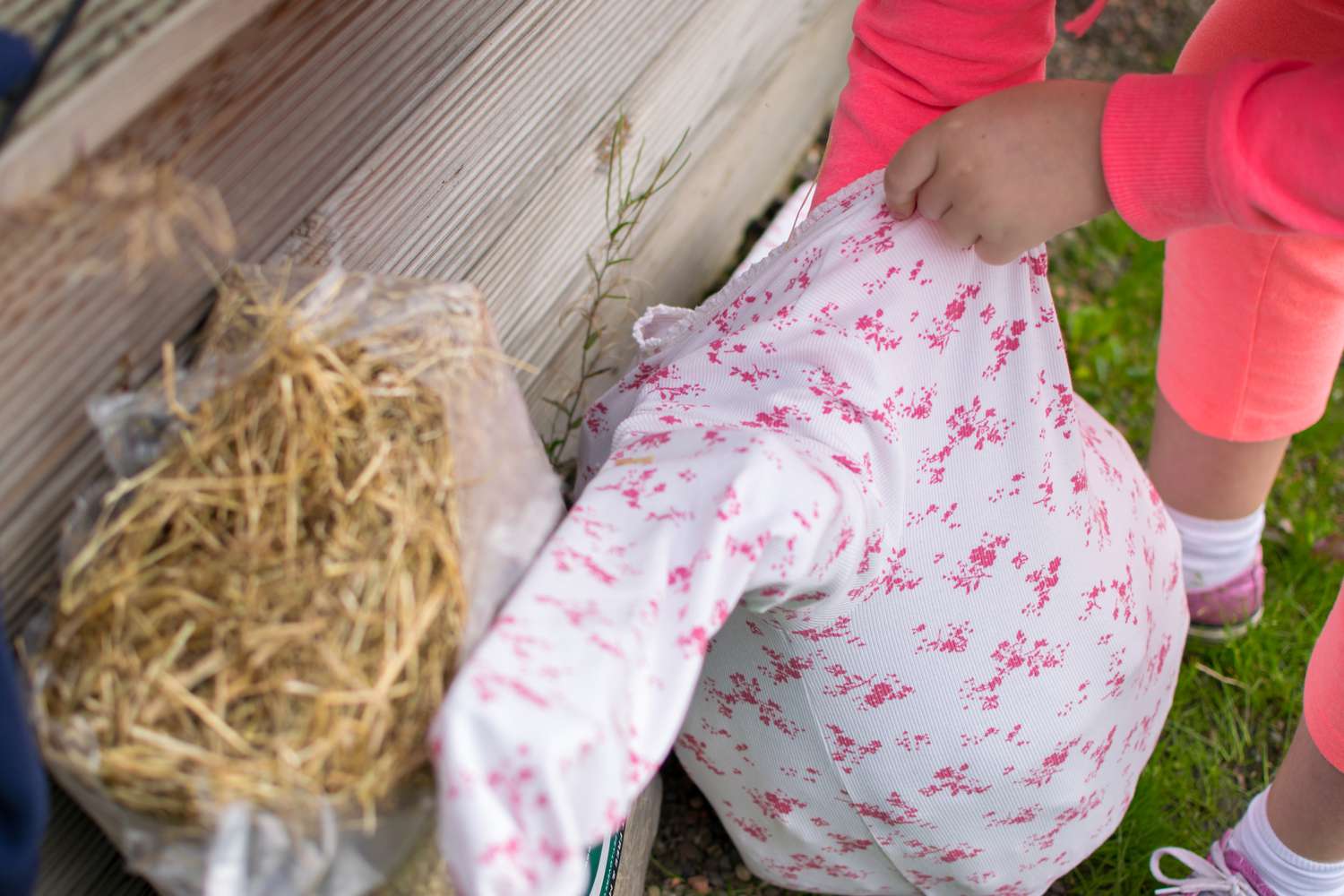 child making a scarecrow