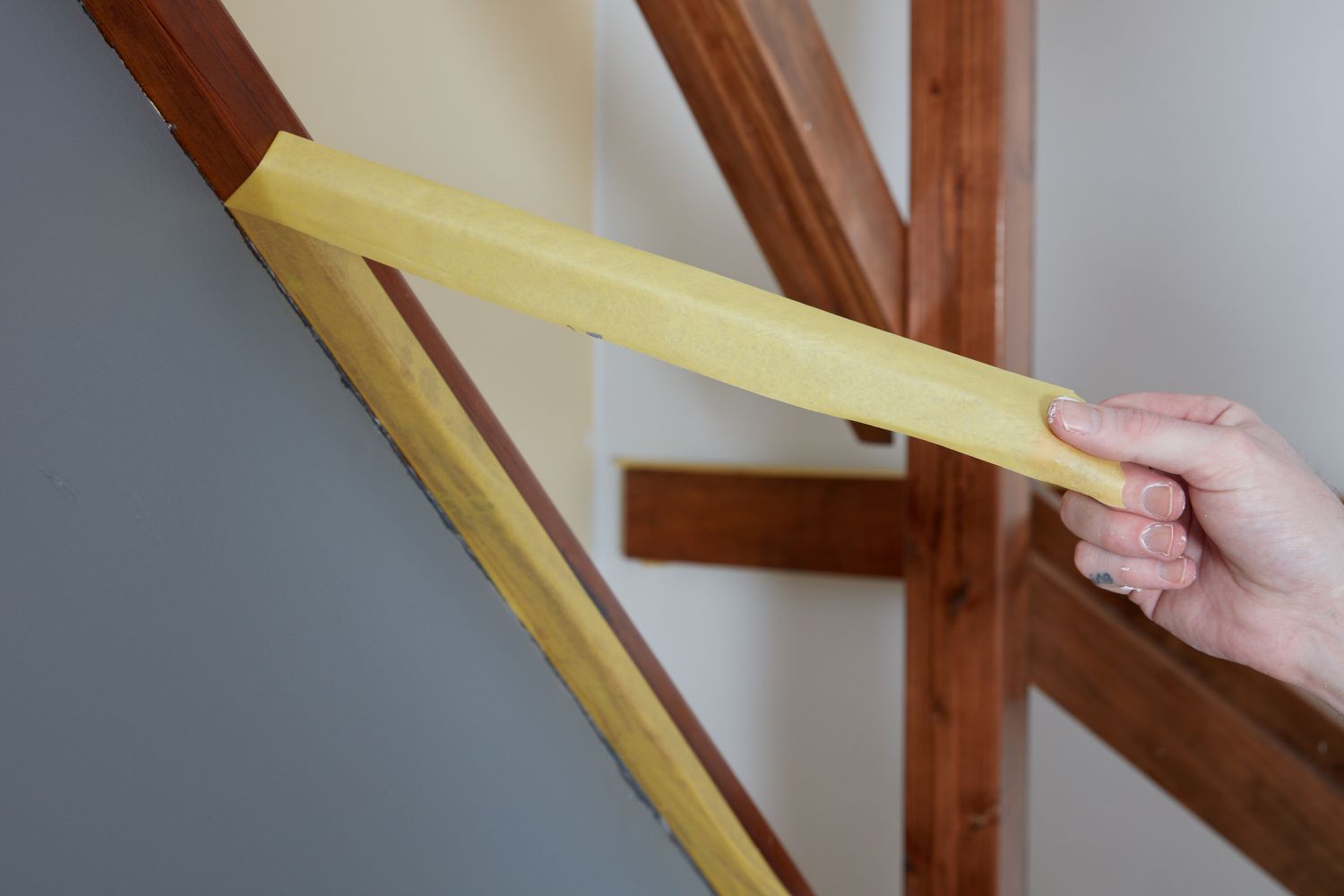 Painter's tape removed from wood trim after painting
