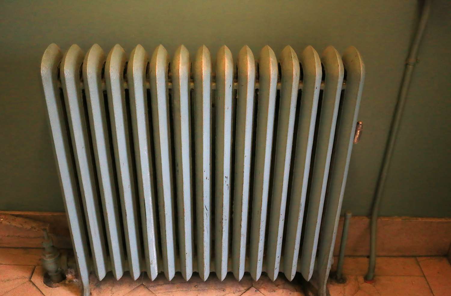 Old style cast iron household steam radiator for heat
