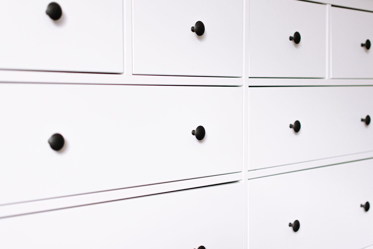 white dresser drawers with black handles