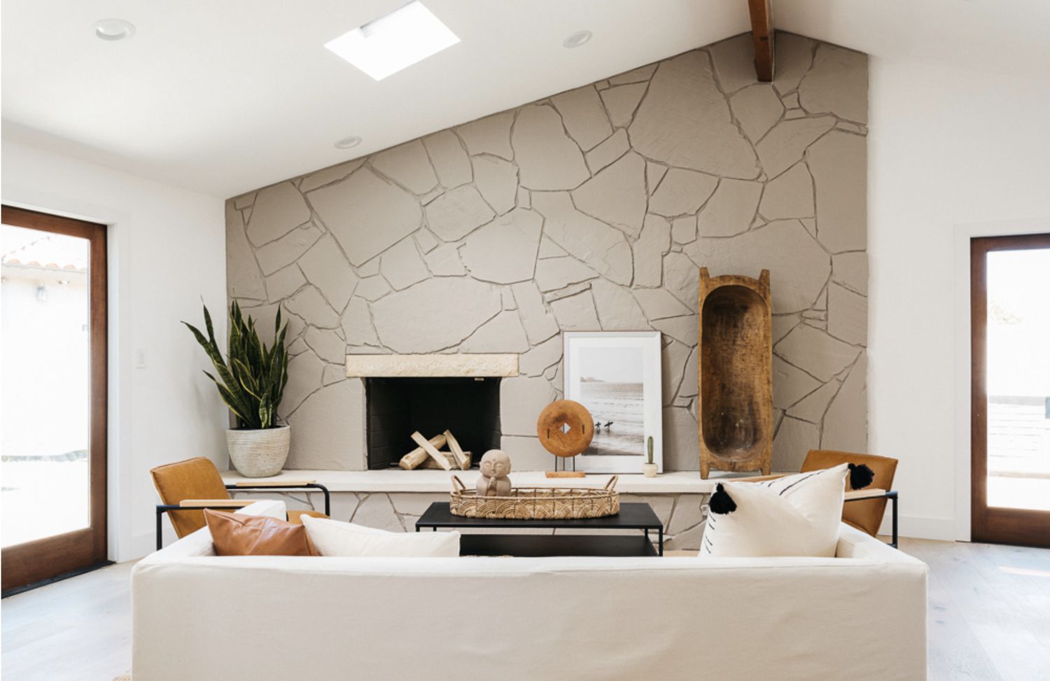 painted warm gray rock fireplace