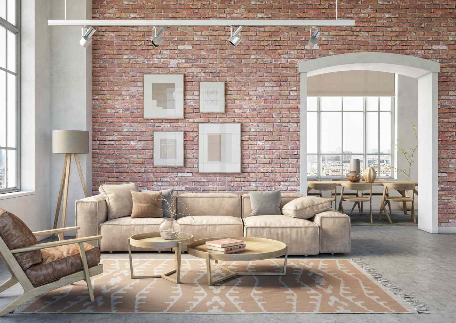 salón con sofá color canela y paredes interiores de ladrillo