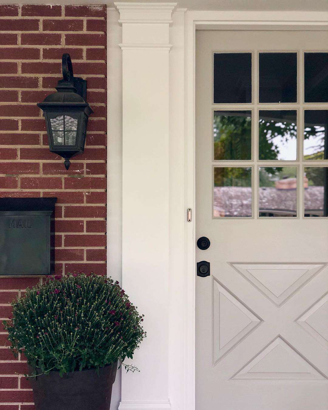 Brick house with a gray door