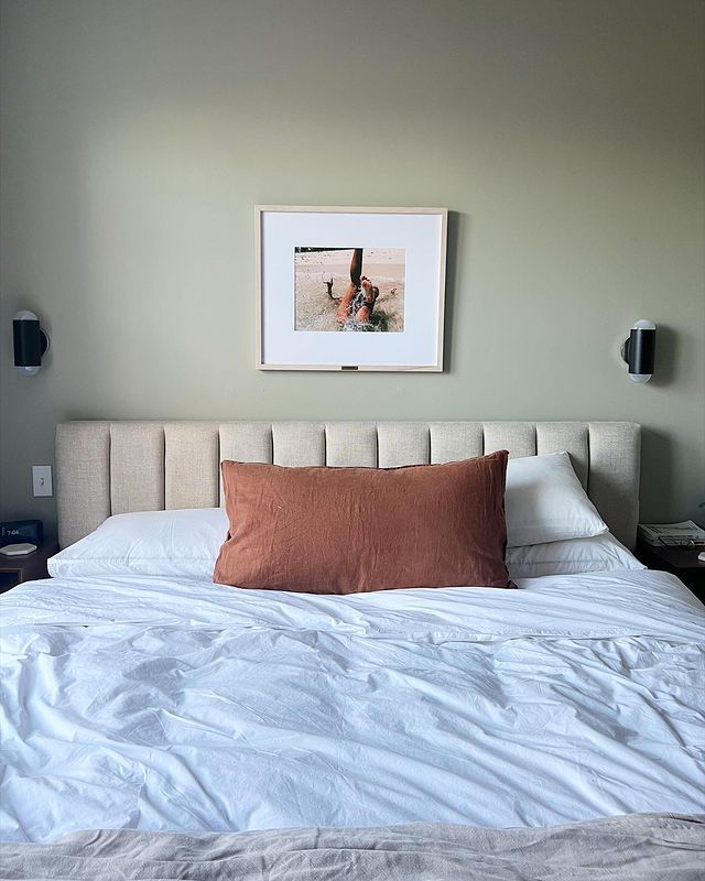 sconces above queen bed