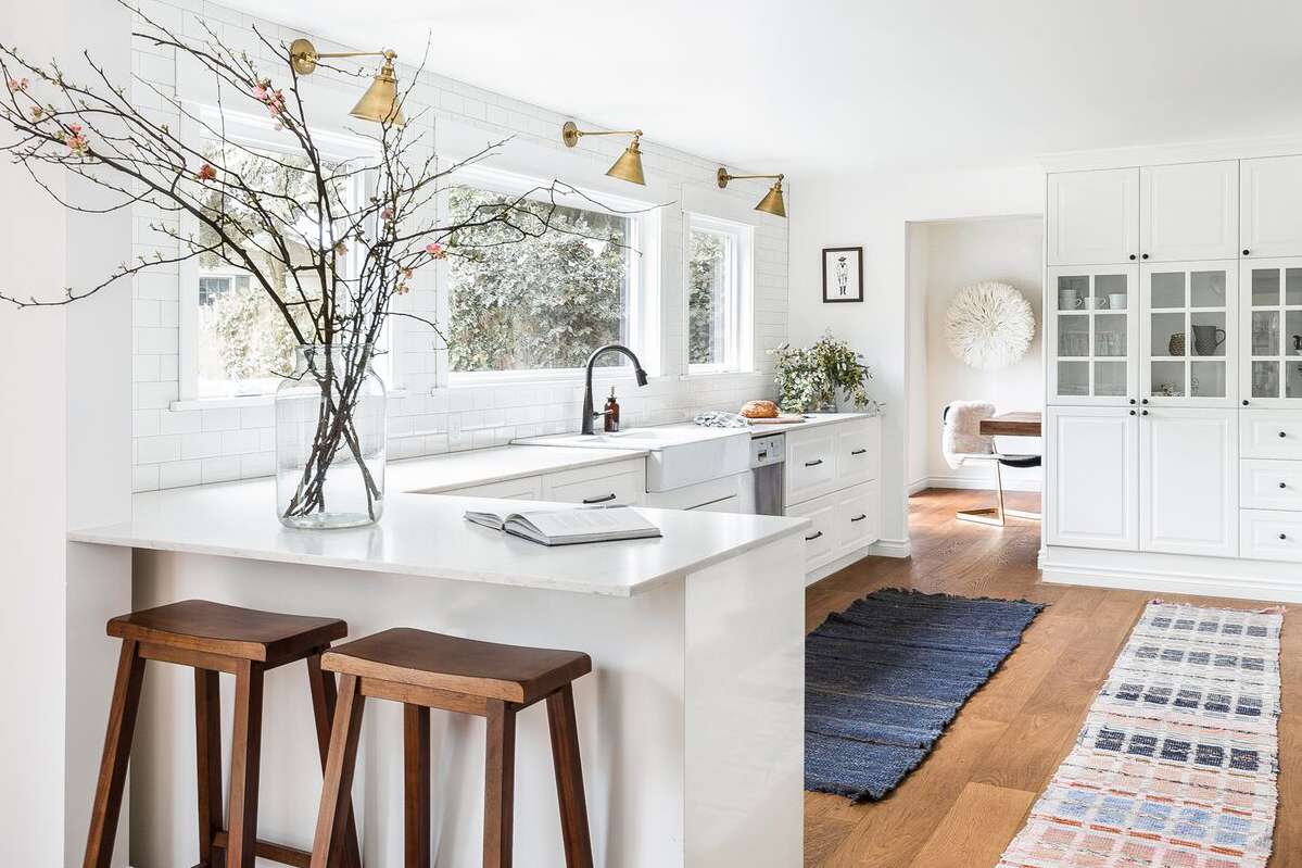 Mercer Island white kitchen with brown stools