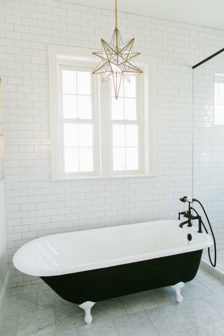 star suspension light over clawfoot tub