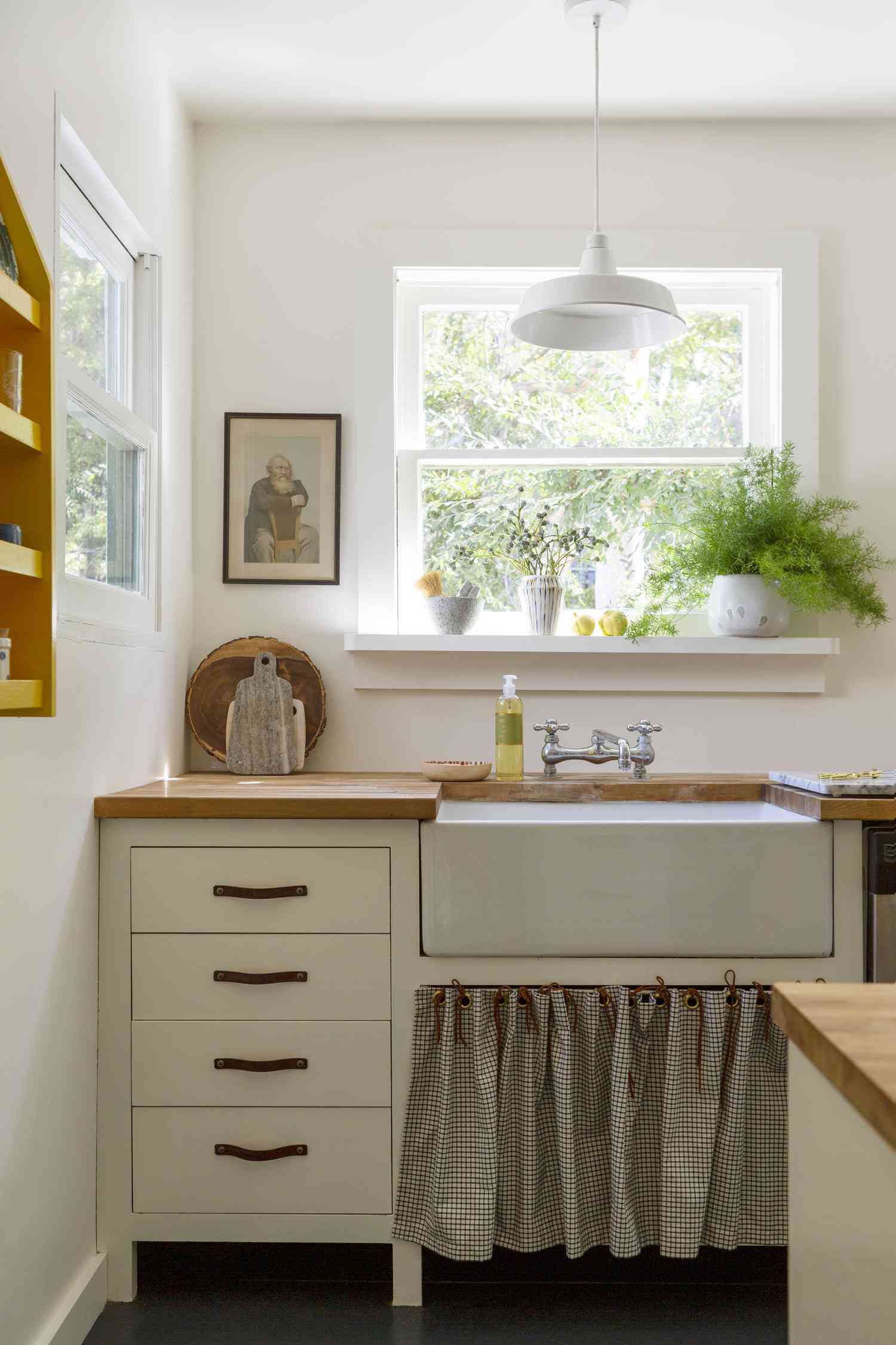Country cottage kitchen with large farmhouse sink.