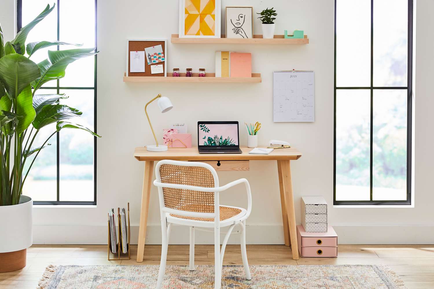 Home office area with colorful decorative items on shelves