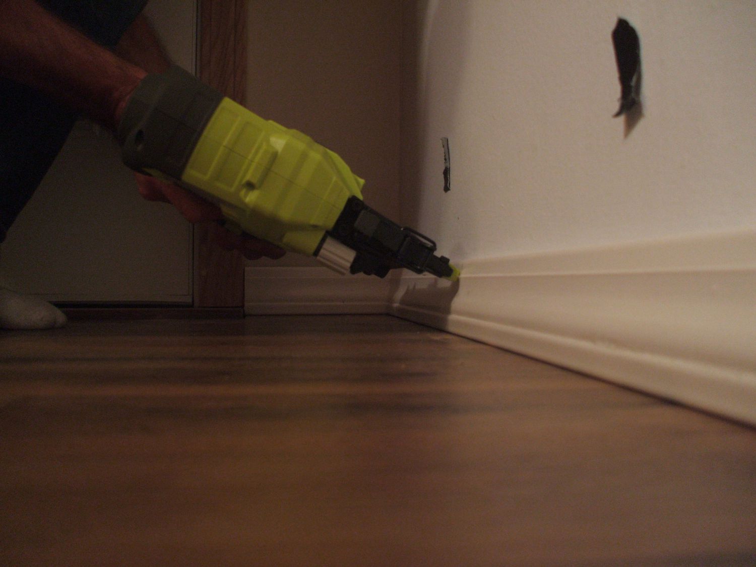 Nail Baseboards in Place