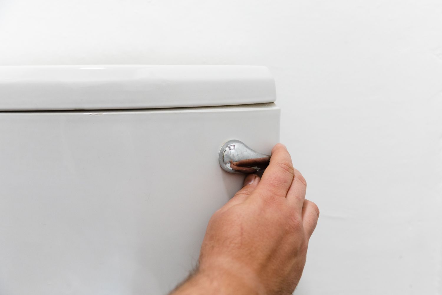 jiggling a loose toilet handle