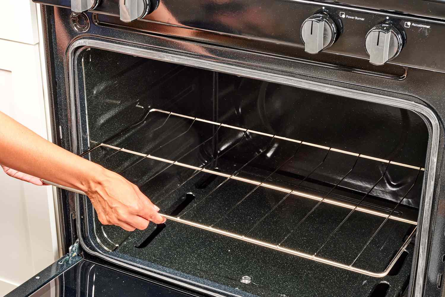 Oven racks inserted back into gas oven