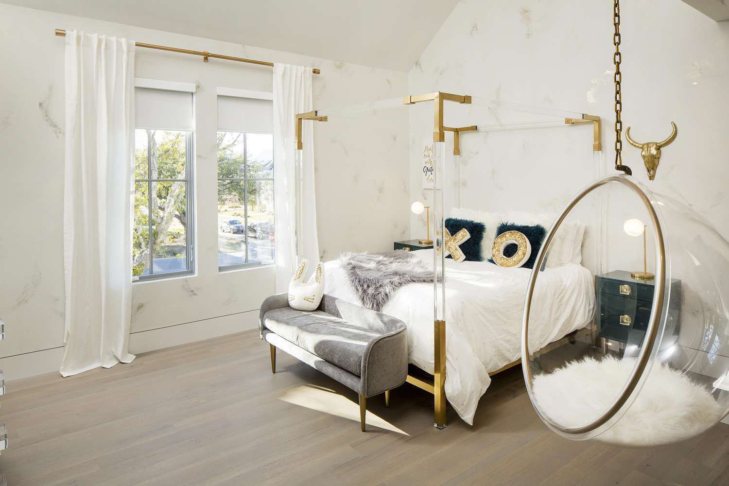 gold, white, and lucite teen bedroom