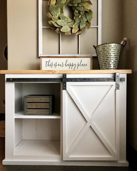 a bookcase with a barn door
