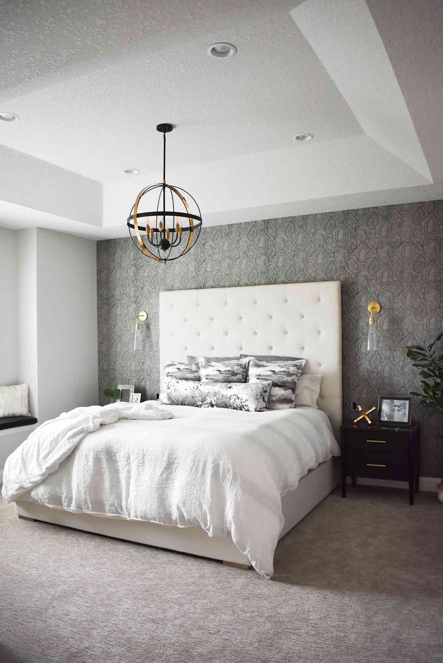 monochromatic gray bedroom with metallic accents