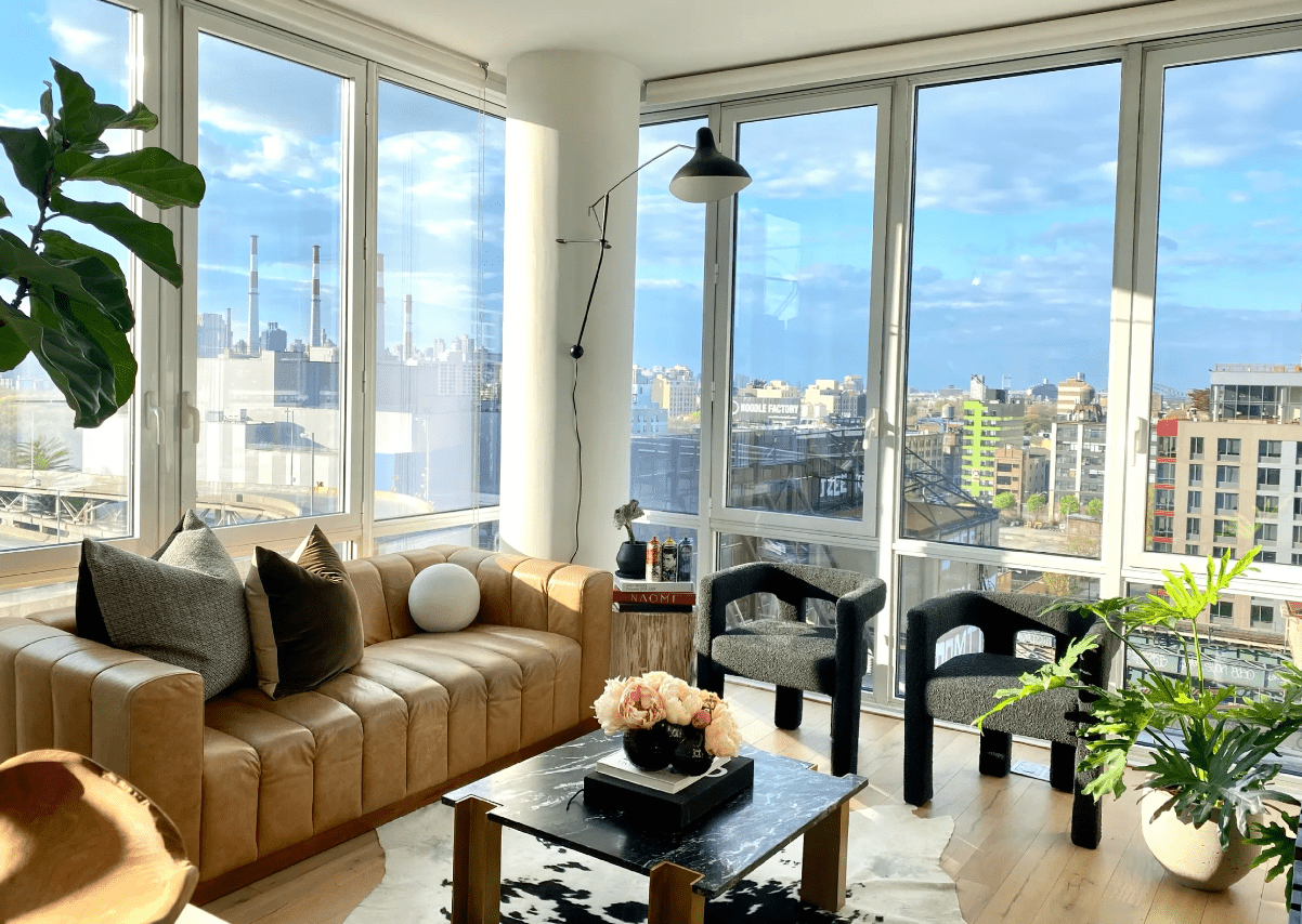 modern neutral living room with tall windows