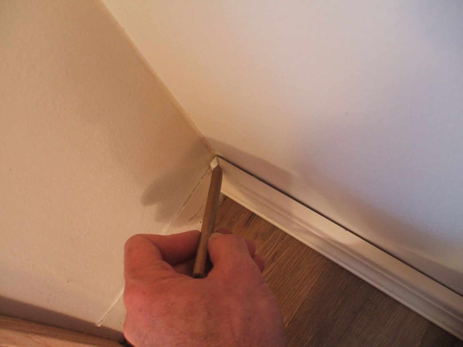 Mark Cut Direction on First Baseboard