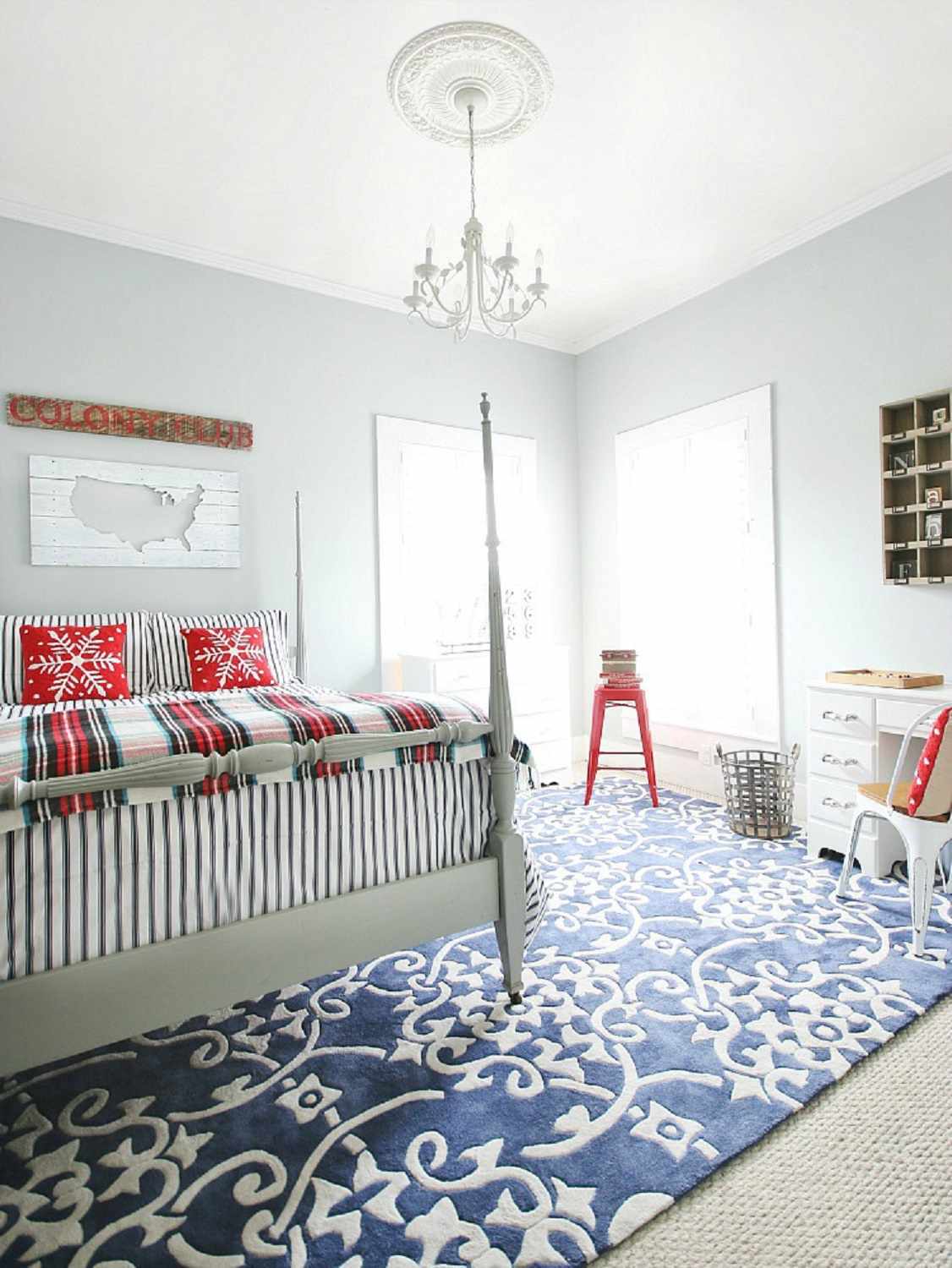 Red, white, and blue farmhouse bedroom