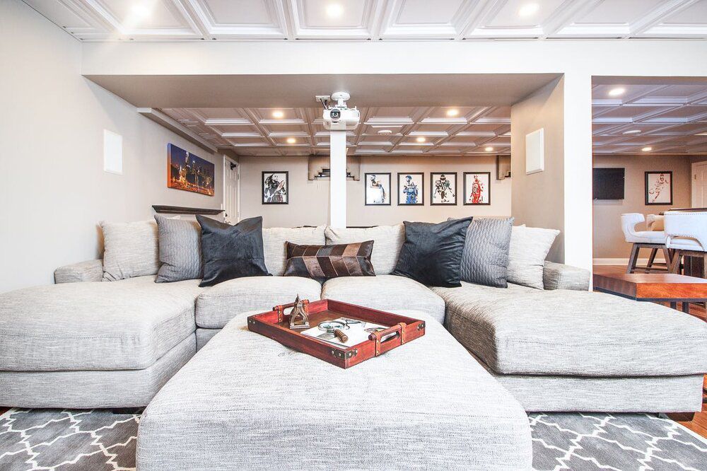 gray couch in basement