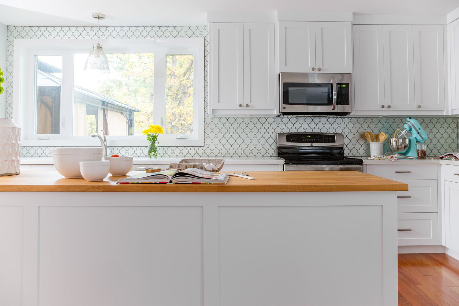 thin maple butcher block countertop in white kitchen