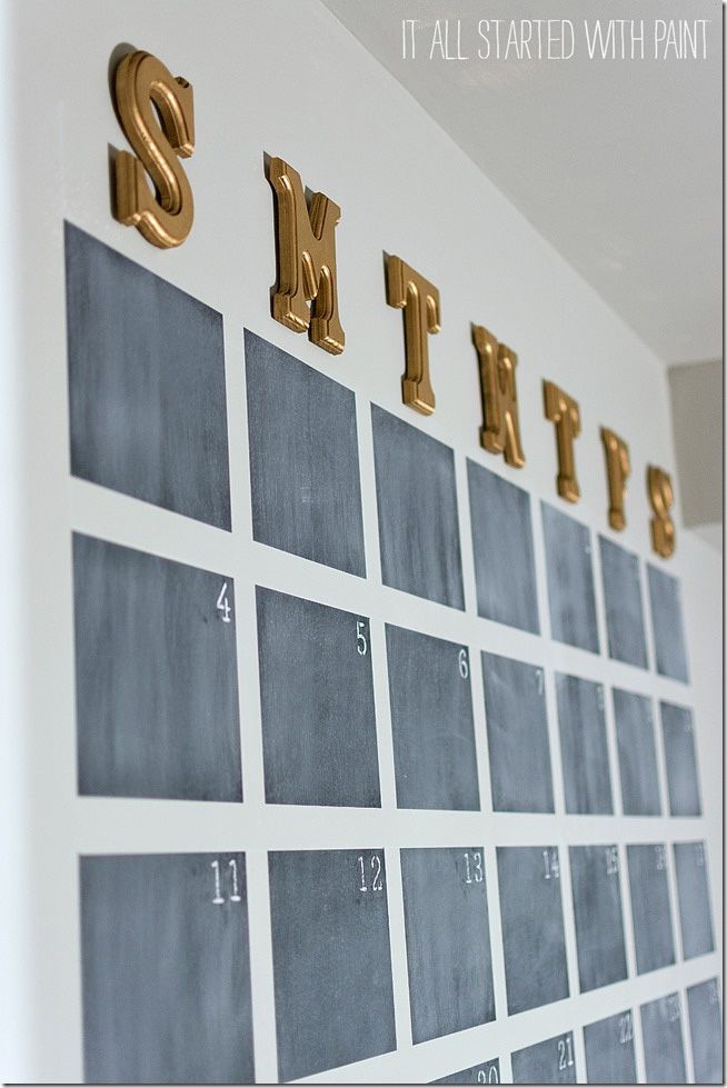 Chalkboard calendar with gold letters