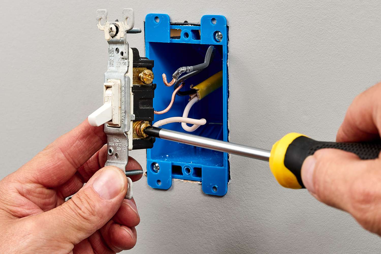 Old switch wiring disconnected by loosening the screw terminal with screwdriver