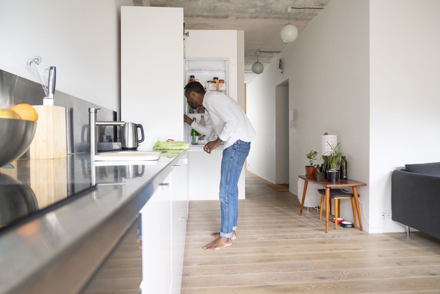 Person cleaning out fridge