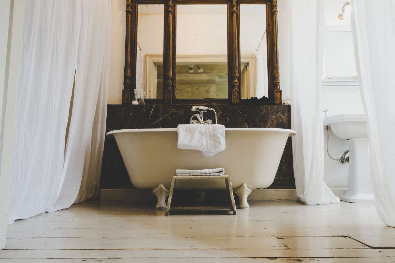 Low angle view of a clawfoot bathtub