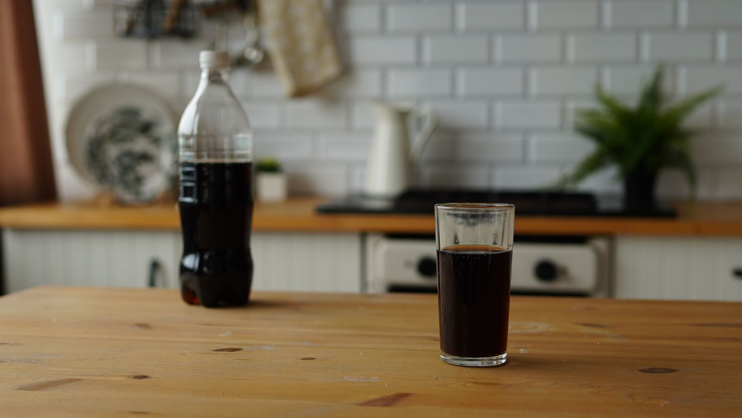 Cola drink on kitchen counter