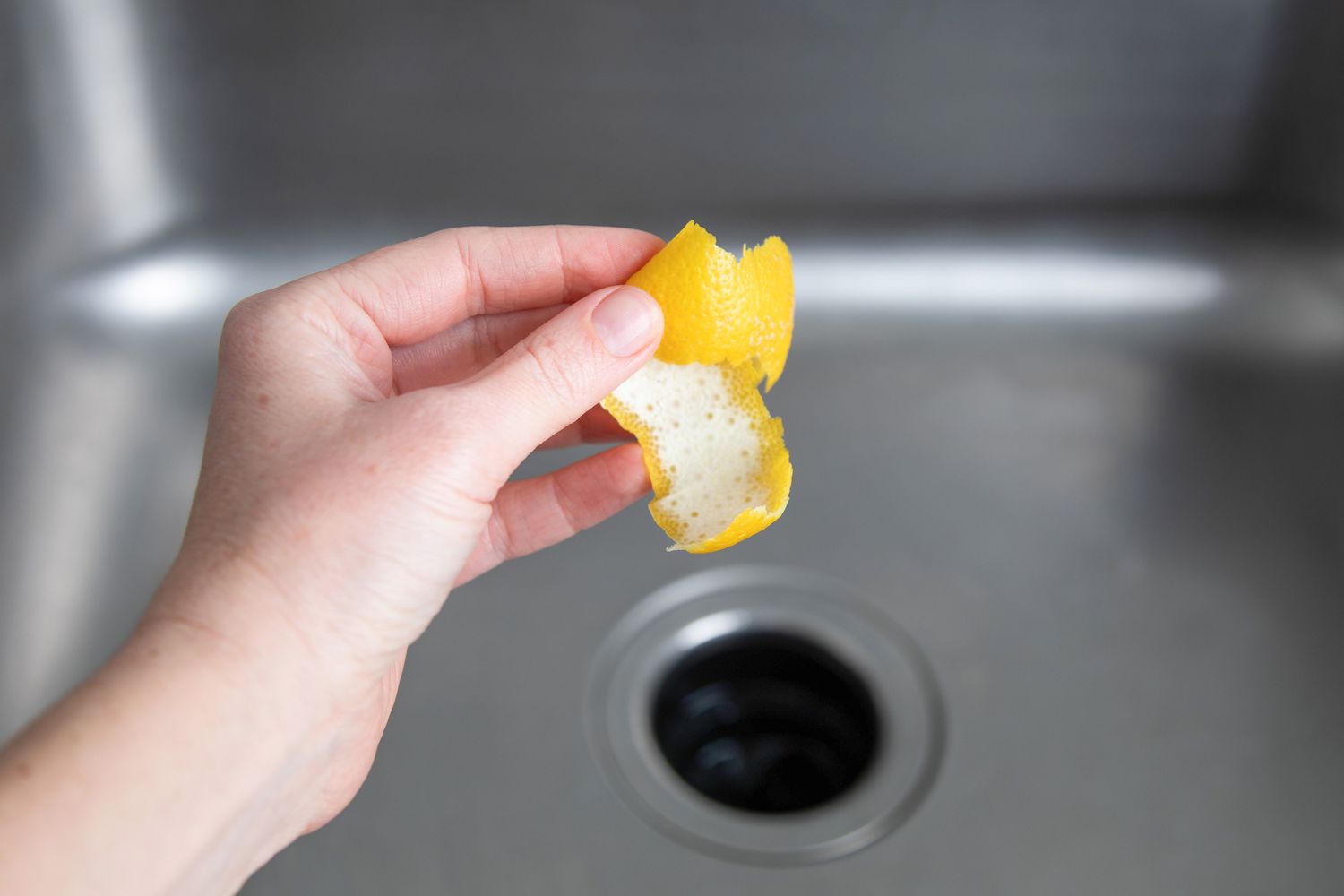 using lemons as a drain cleaner