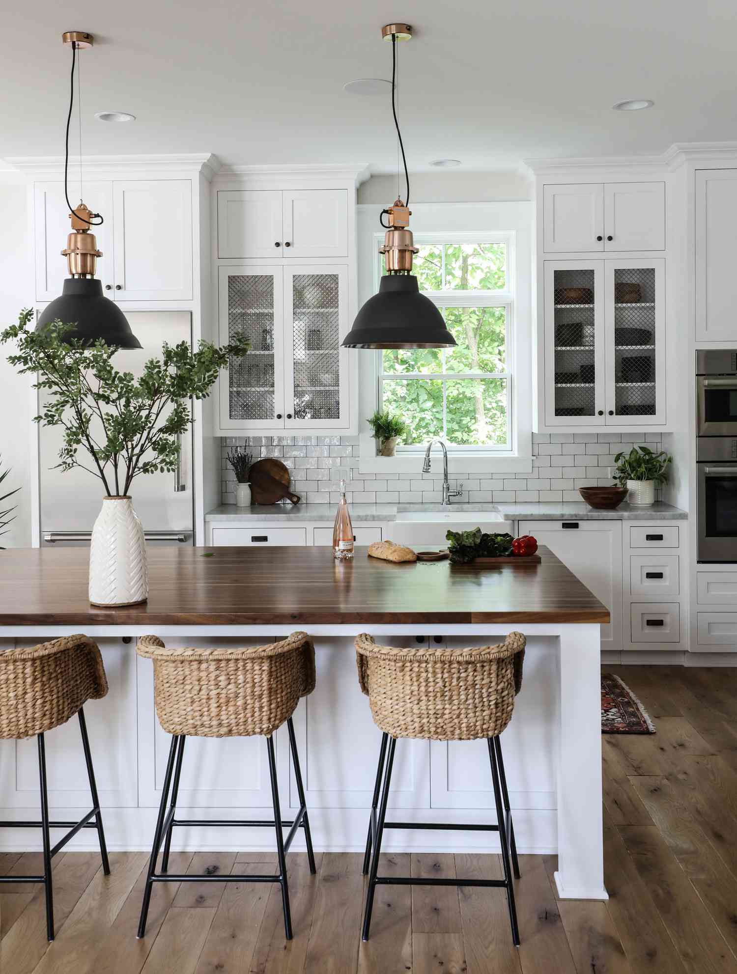 greenery in traditional white kitchen