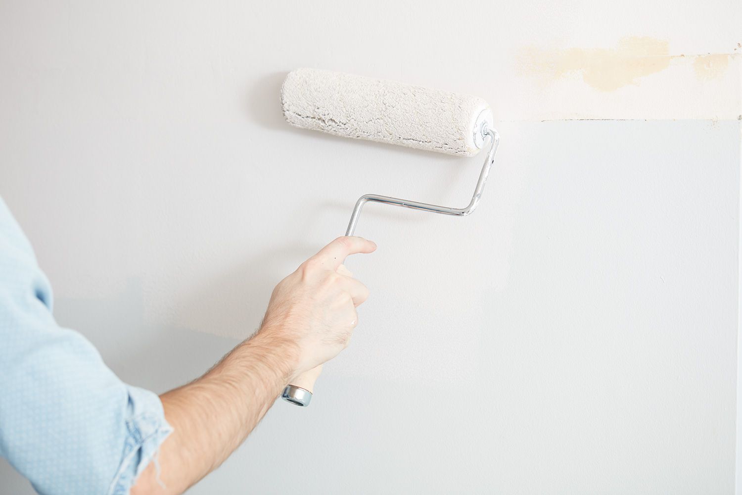 Man painting wall