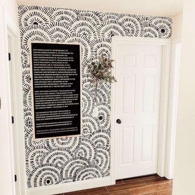 black and white mural by door