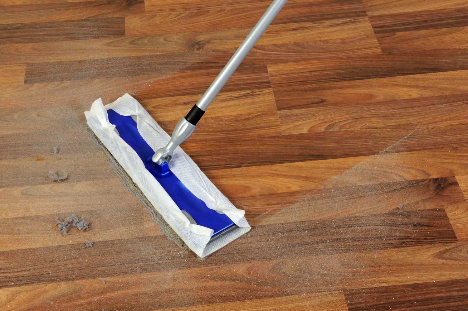 Cleaning wood floor with mop