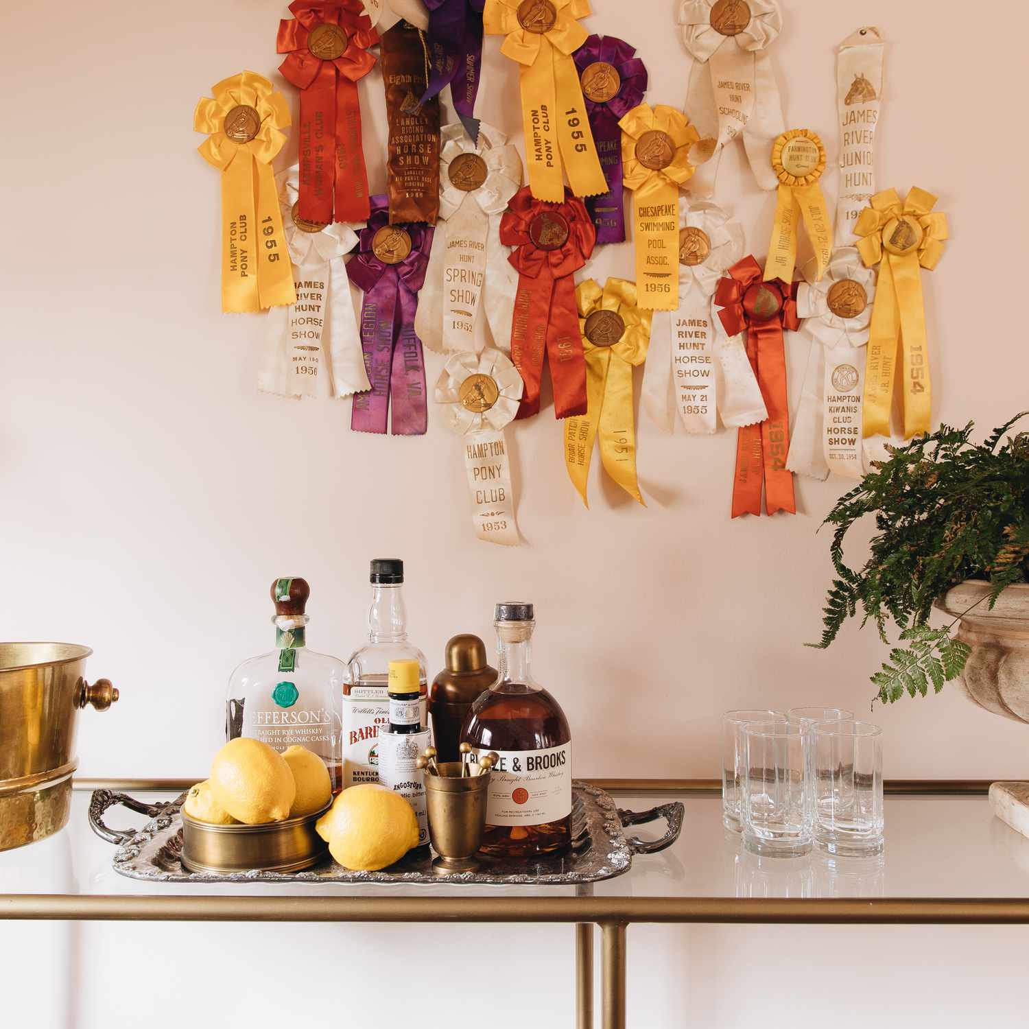 horse ribbon display above bar cart