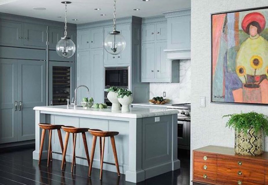 gray blue kitchen with black floors
