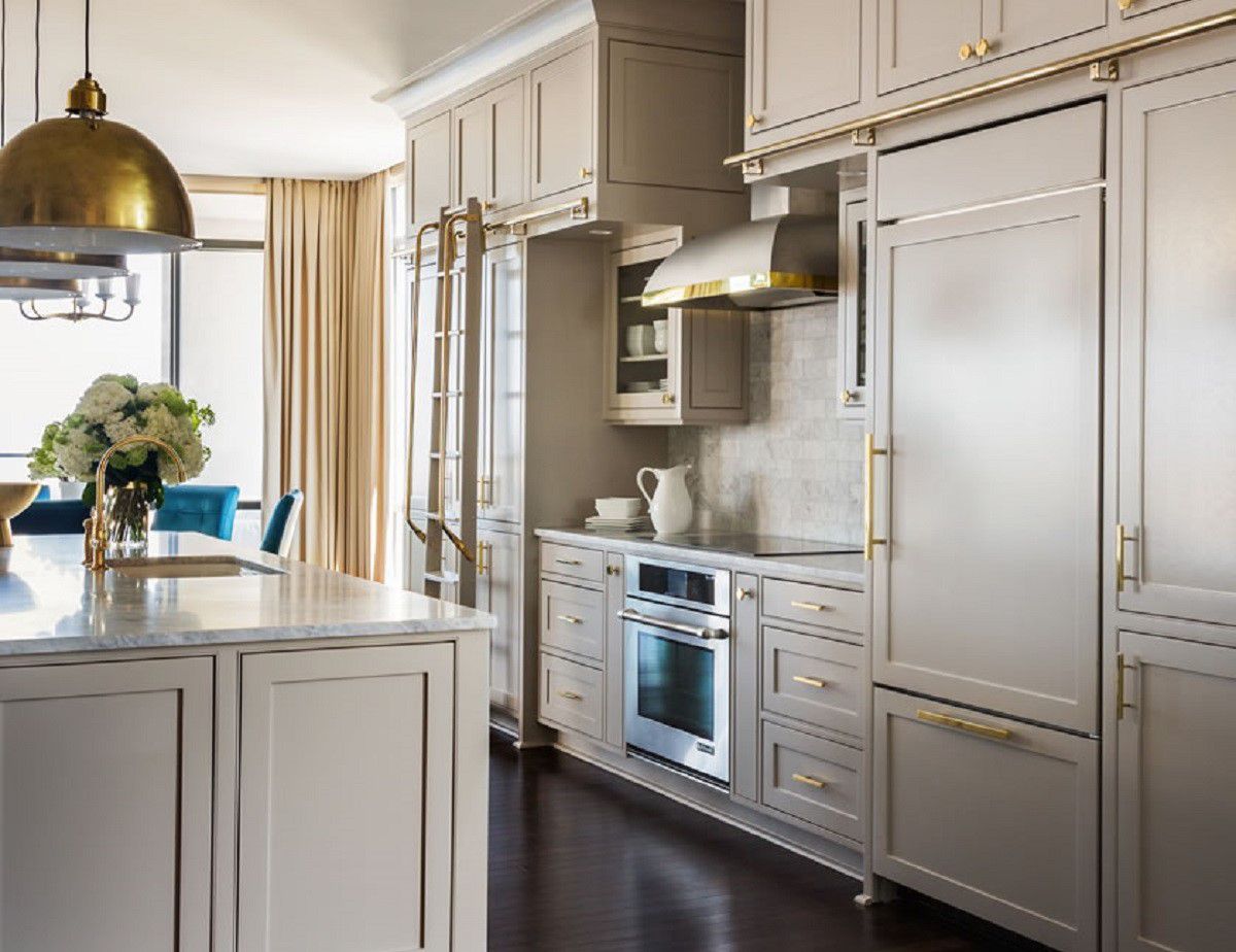 Brass Fixtures, Cream Kitchen Cabinets