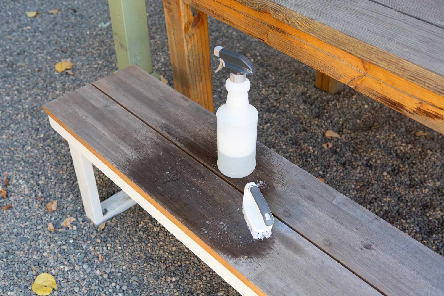 cleaning teak furniture with a soft brush and bleach / detergent mixture