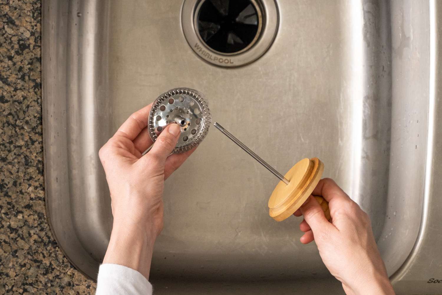 French press filter unscrewed from plunger in kitchen sink