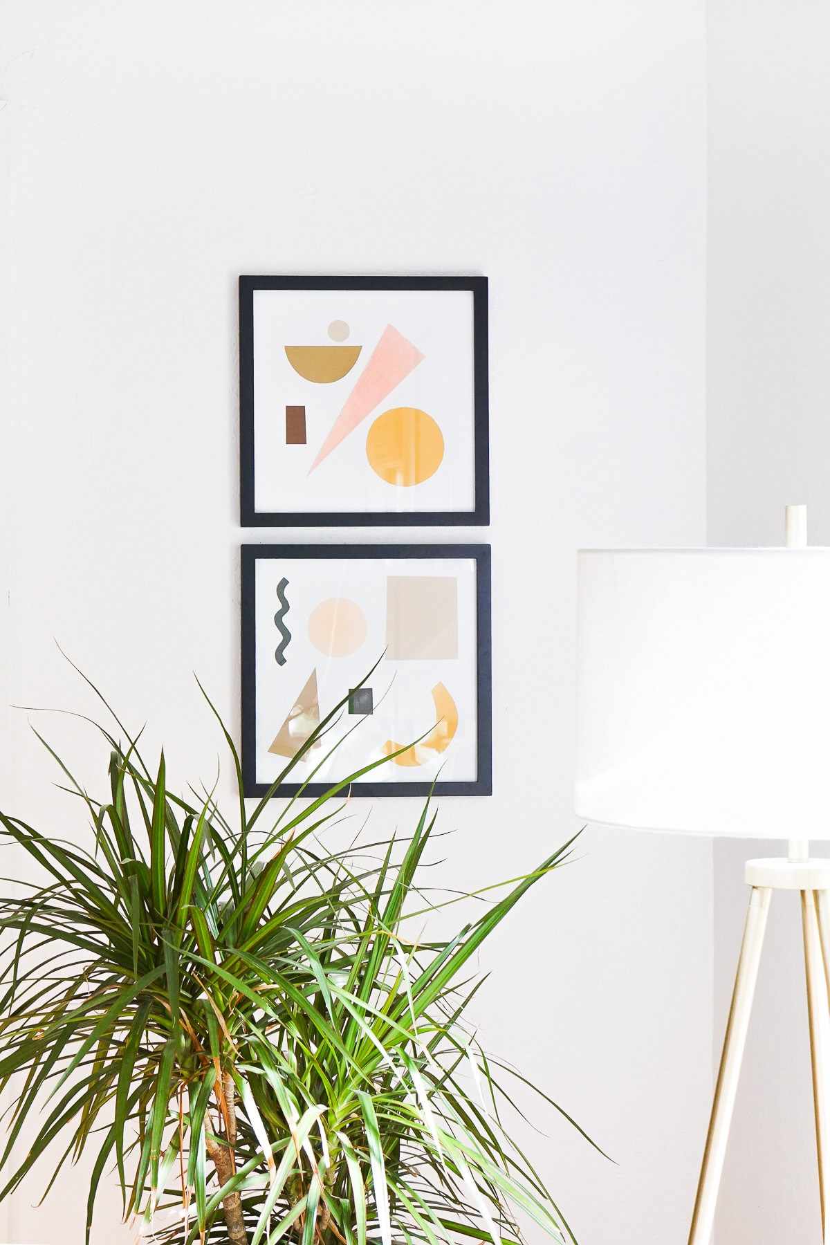 Two framed pieces of artwork featuring different shapes