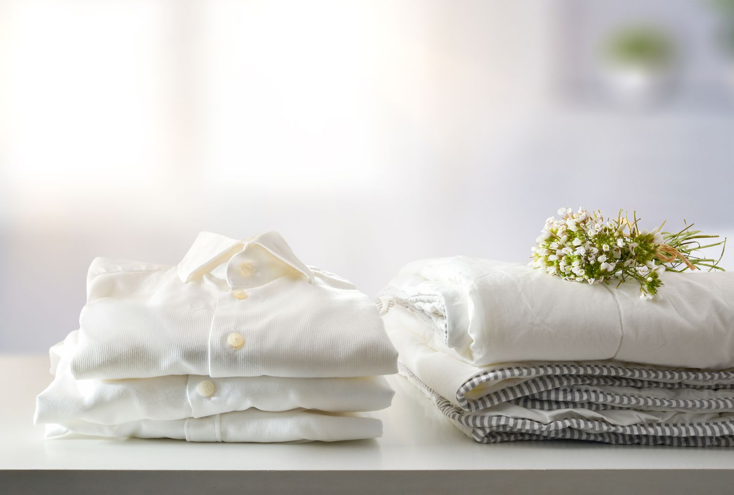 Folded clothes on shelf