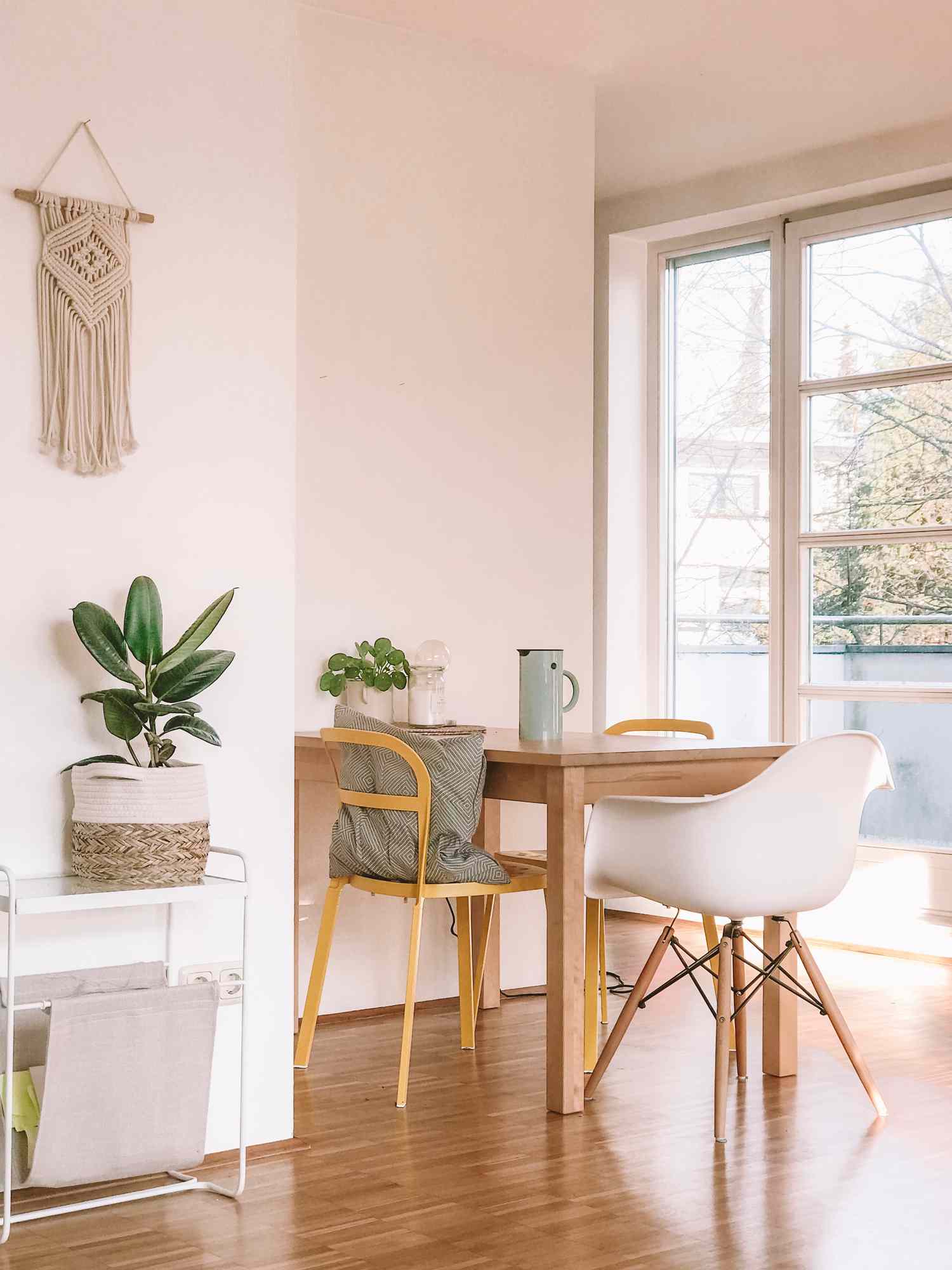 quiet dining area with chairs and plants