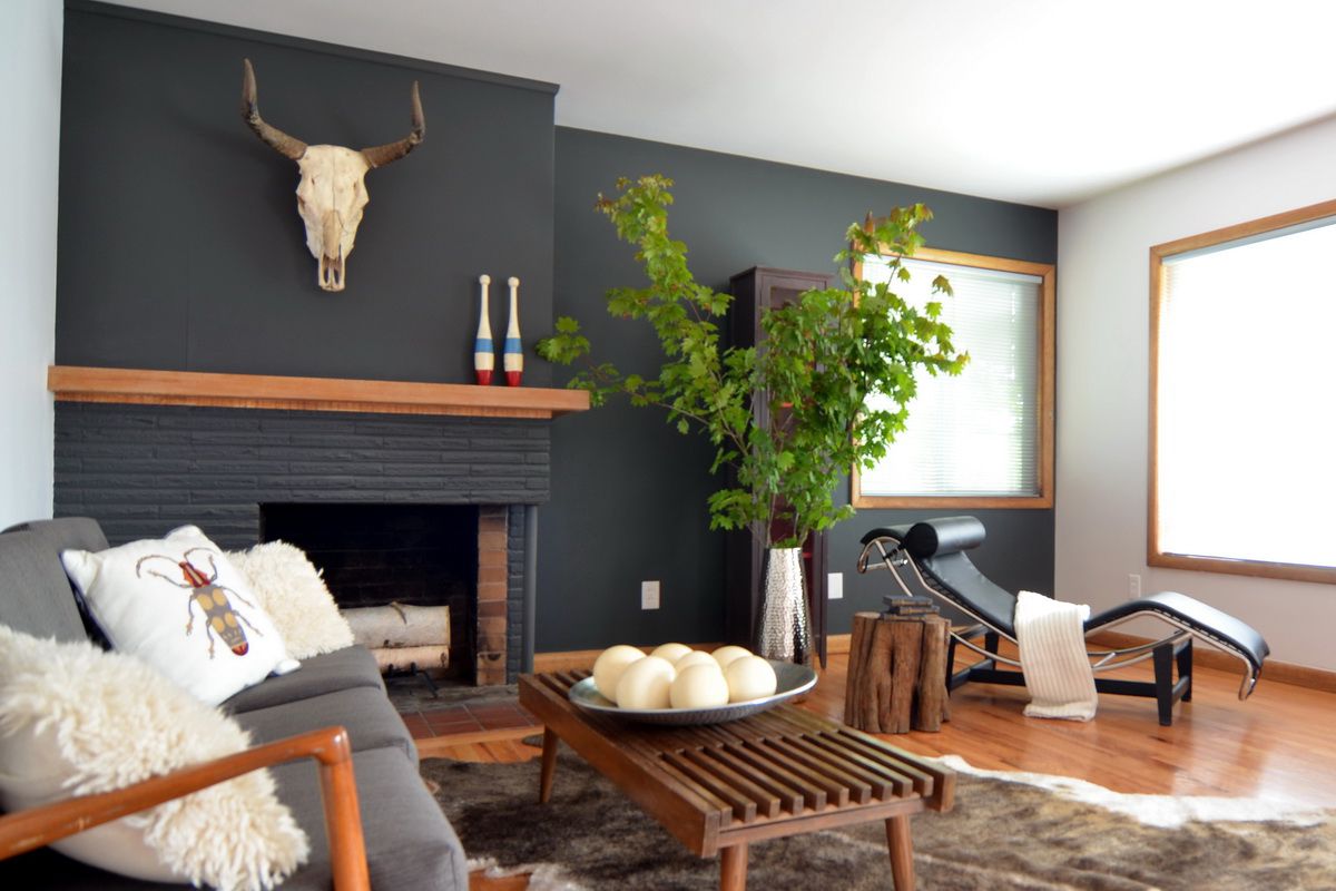 black brick fireplace wood mantel