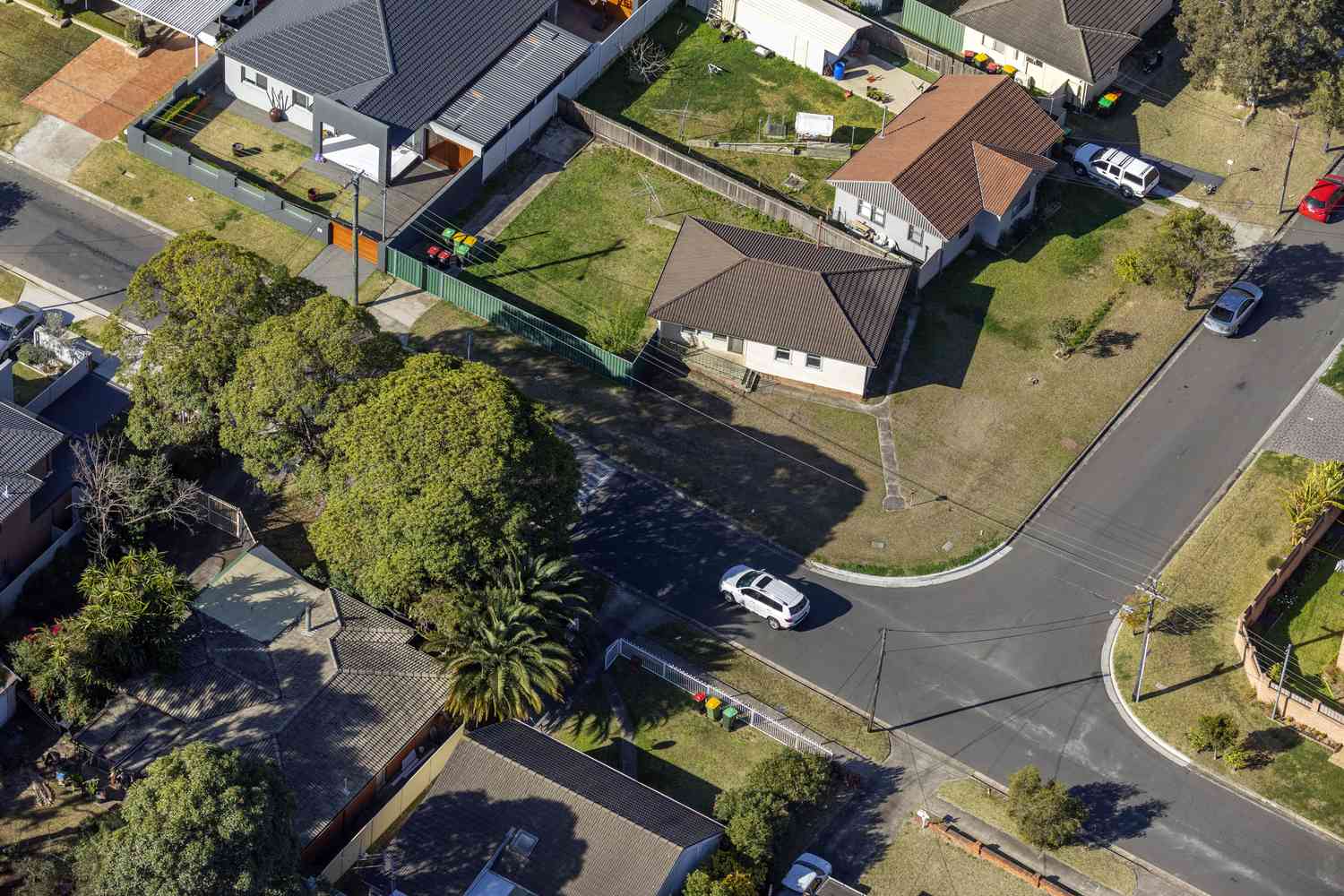 aerial view of a T-intersection in a residential neighborhood