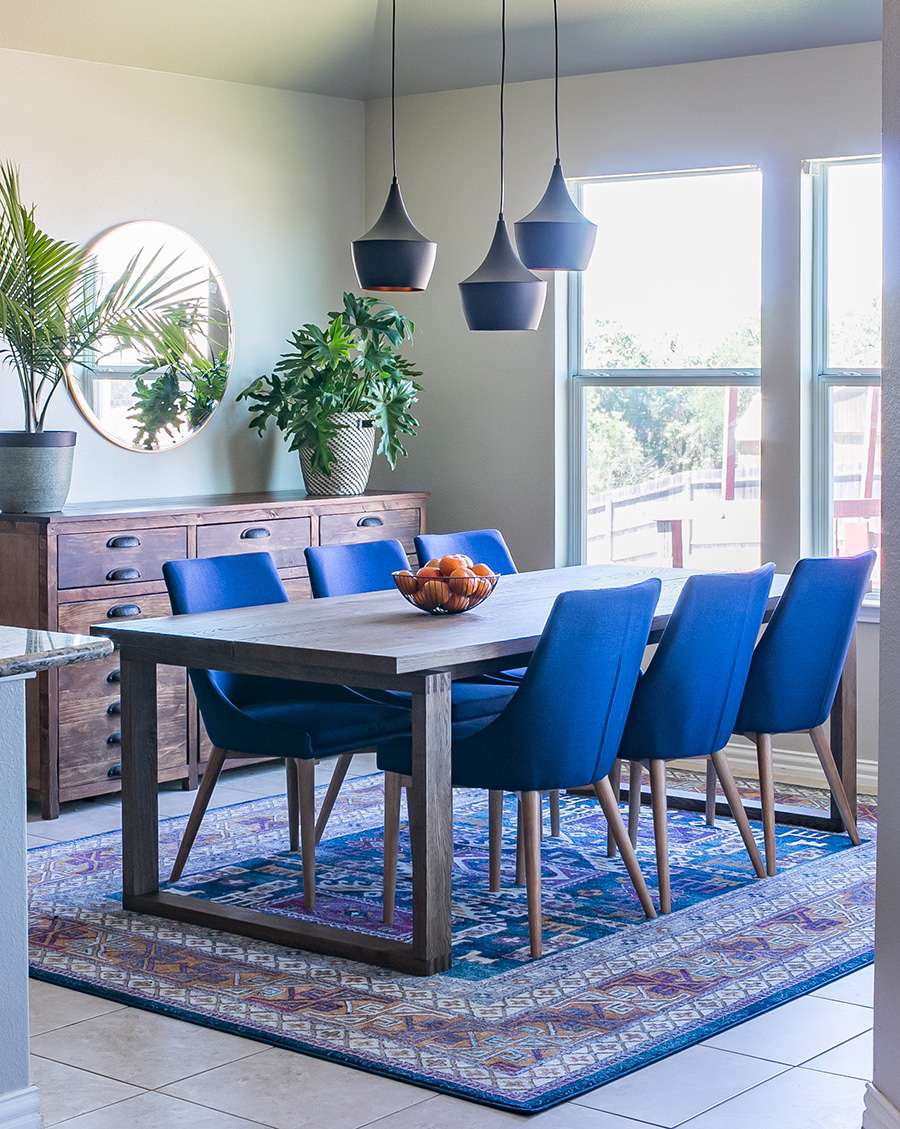blue dining chairs and rug