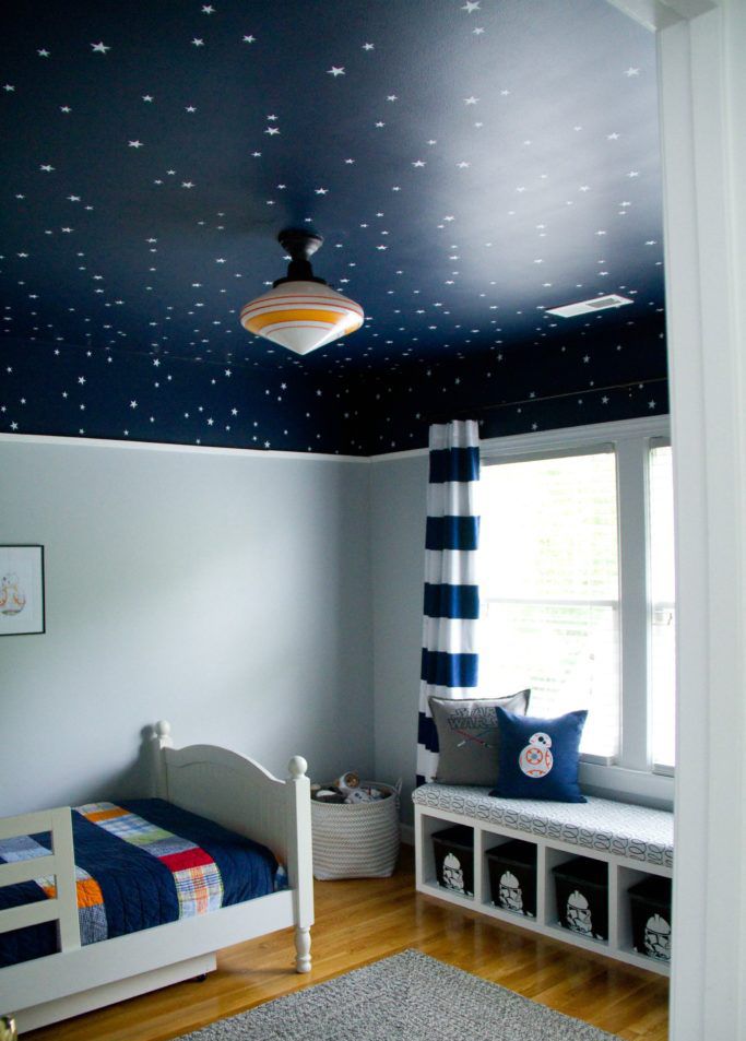 Star Wars space-themed bedroom with star ceiling mural