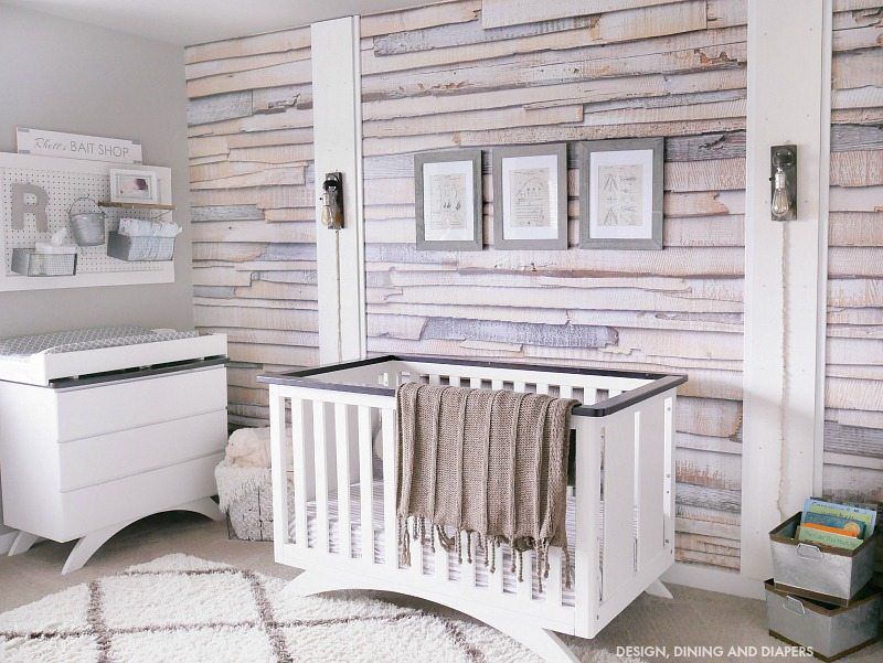 rustic nursery with wood print wall accent wall