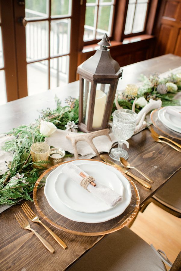 antler centerpiece on wood table