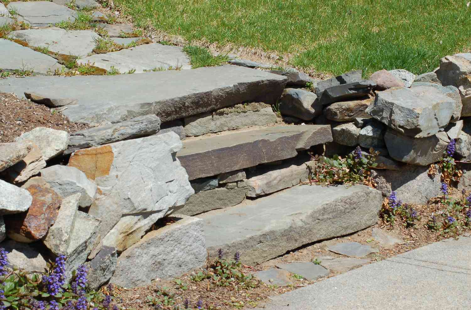 Stone steps climbing a slope.