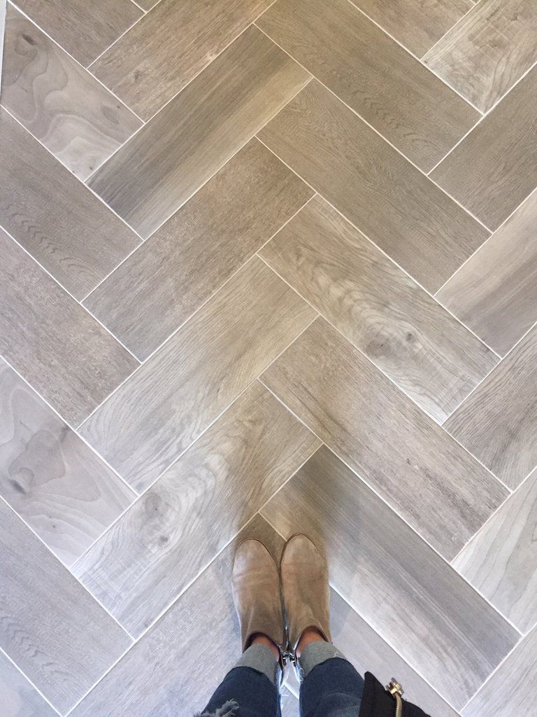 Standing on mushroom color herringbone pattern floor viewed from above