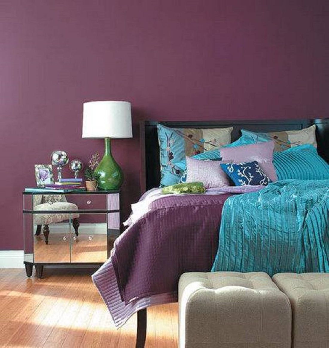 Purple walls in a sophisticated bedroom.